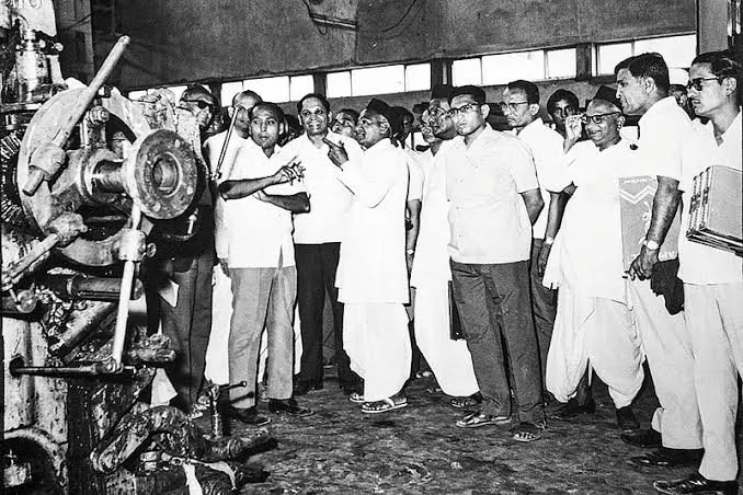 Archival photograph of a mill visit